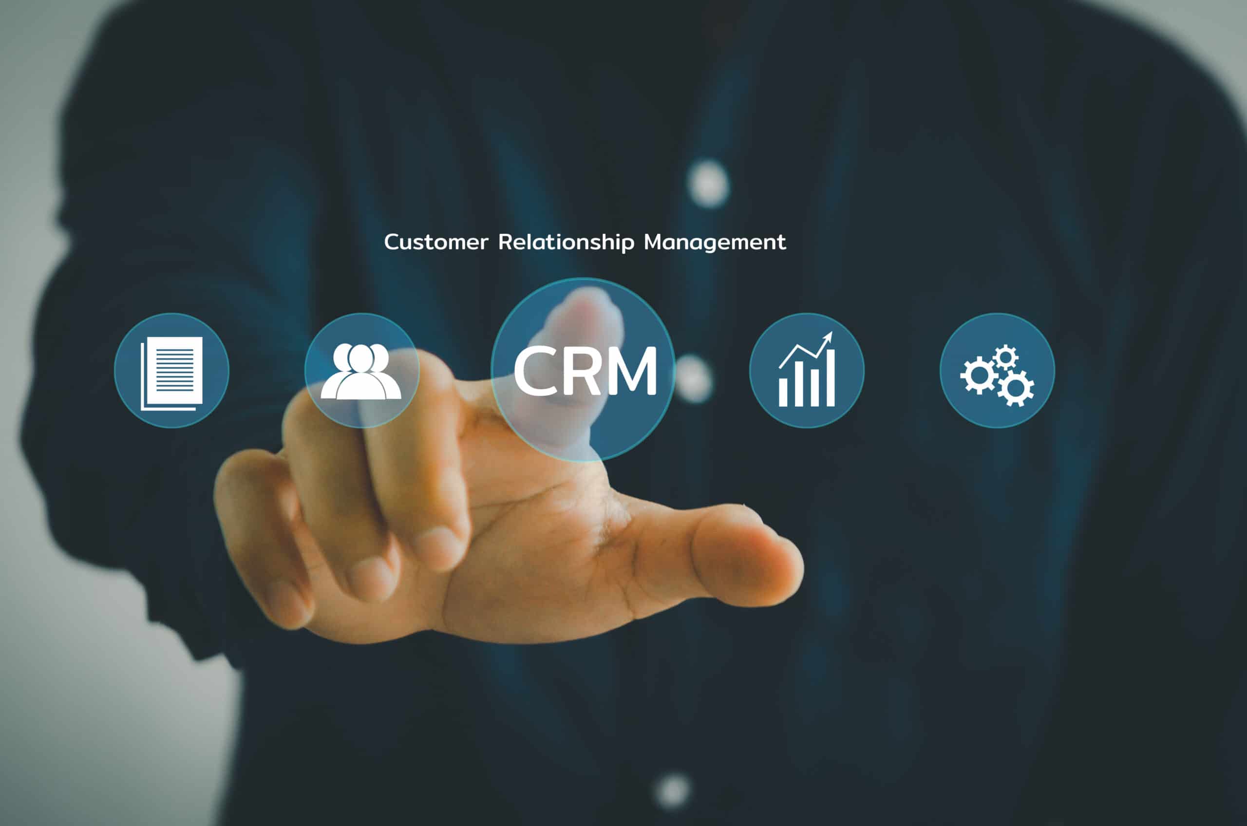 Hand touching CRM  Customer relationship management automation system software.business technology on virtual screen concept.